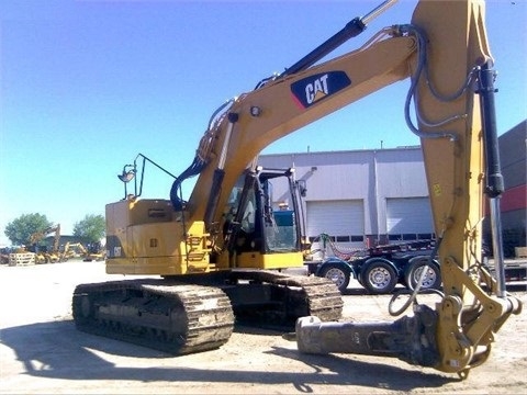 Caterpillar 328D de segunda mano en venta Ref.: 1404350198500777 No. 3